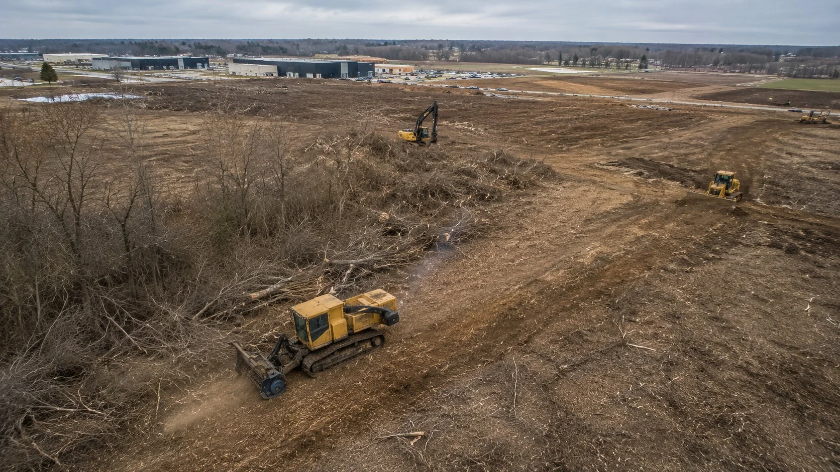 Commercial land clearing operation in Central Ohio with multiple pieces of equipment