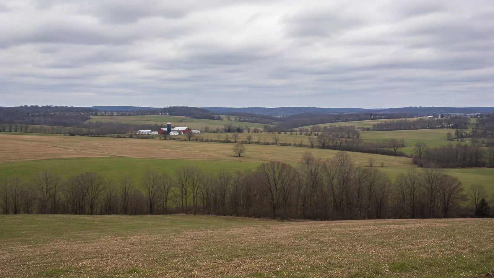 Fairfield County Ohio agricultural countryside with rolling farmland and red barn