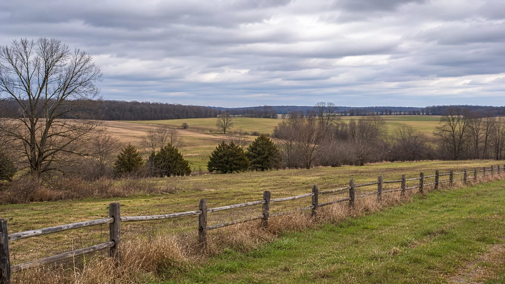 Rural landscape near Newark Ohio with rolling farmland and wooded areas